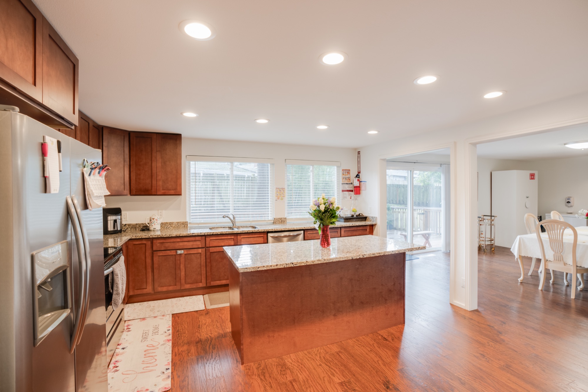 Open-plan kitchen flowing into the dining area