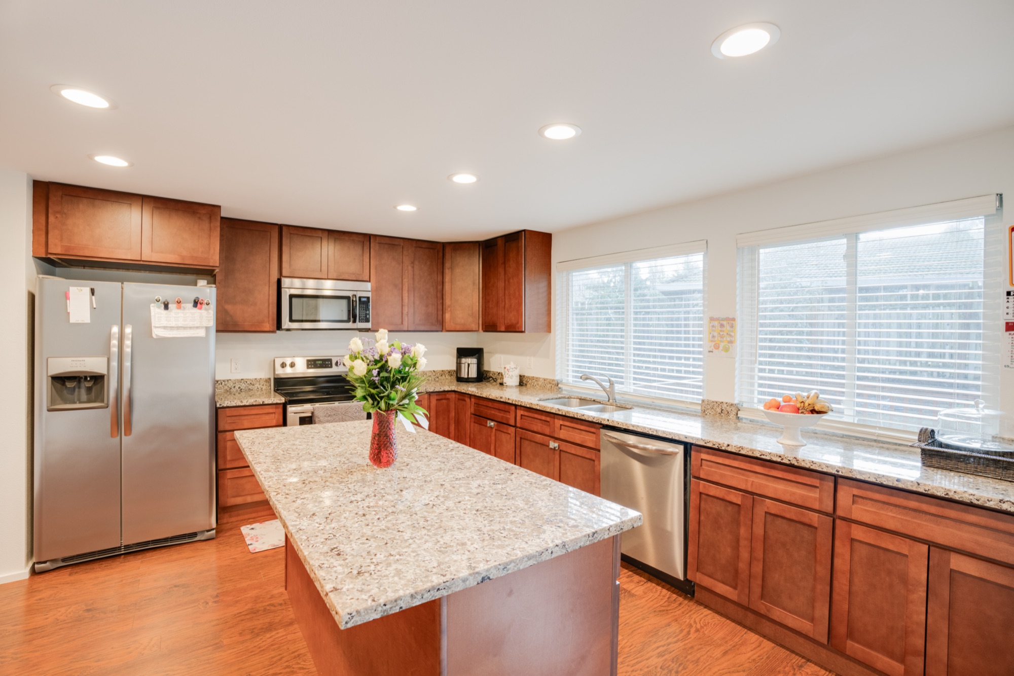 Home kitchen with granite island