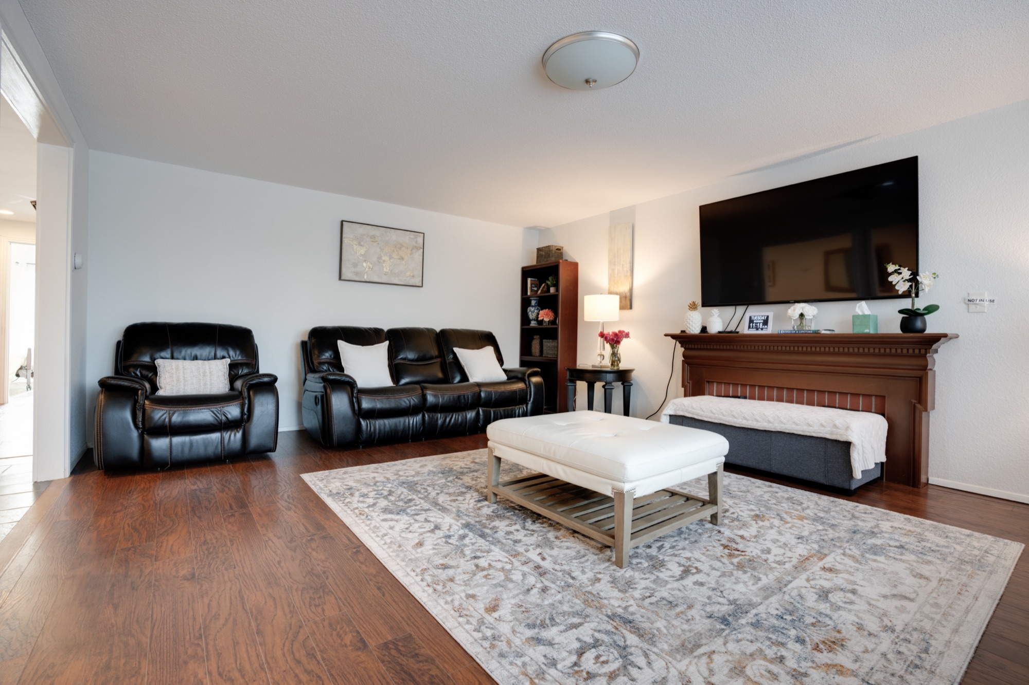 Living room seating with recliners and an ottoman